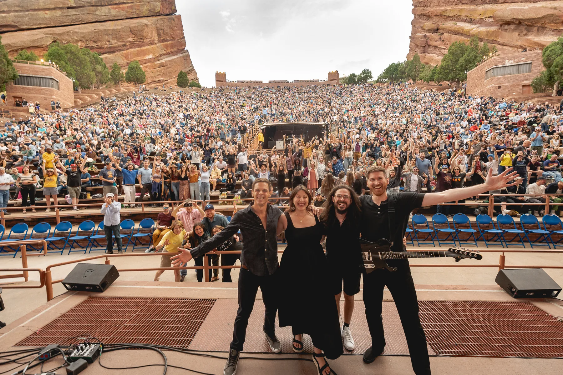 DARKARTS on stage with the Red Rocks audience